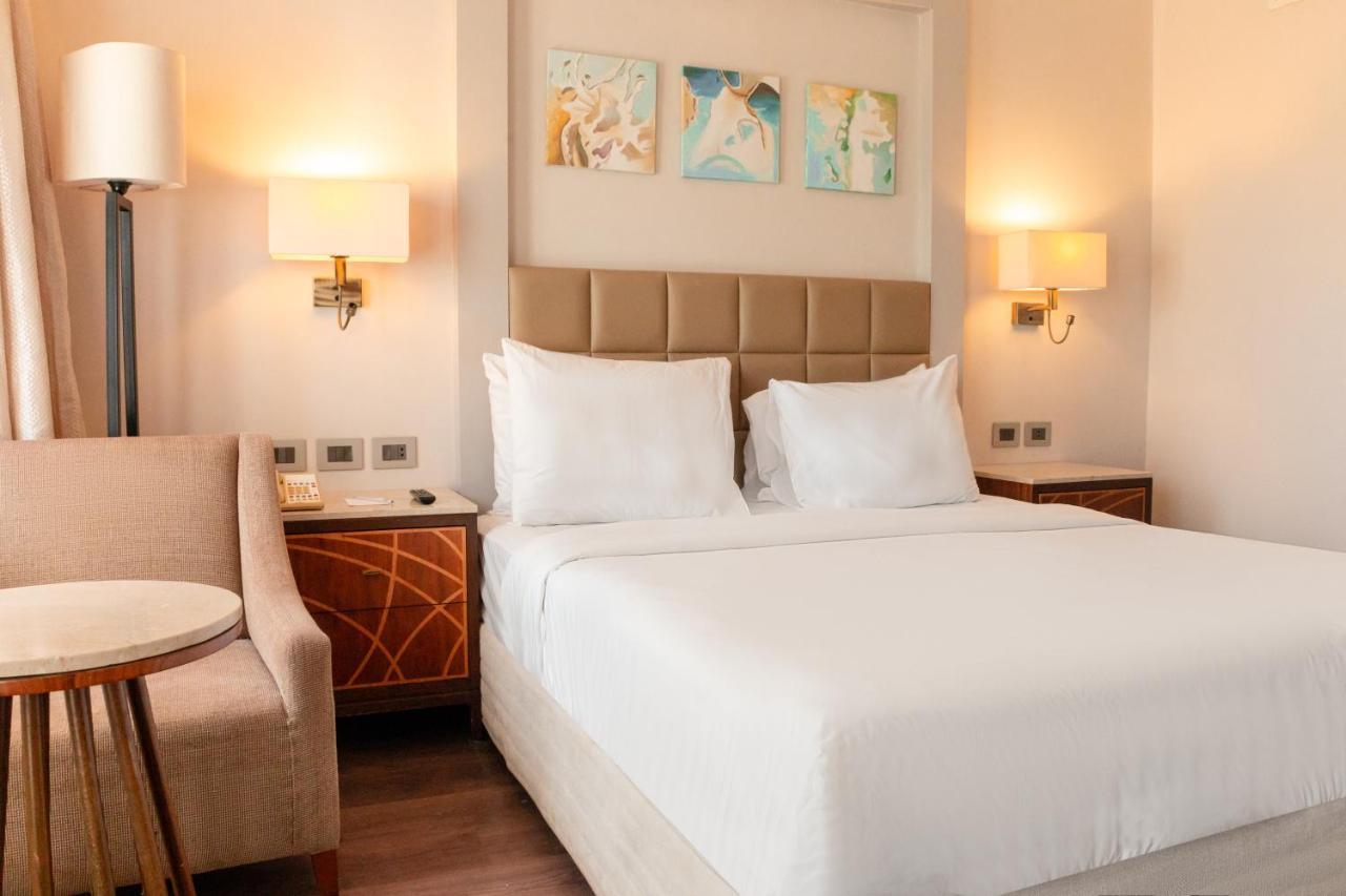 Hotel Sharm Dreams Vacation Club - Aqua Park Exteriér fotografie A bedroom at the hotel