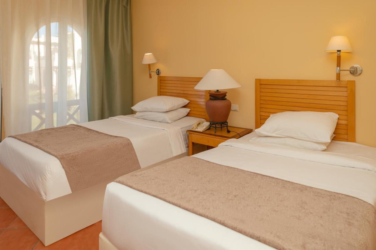 Hotel Sharm Dreams Vacation Club - Aqua Park Exteriér fotografie A bedroom